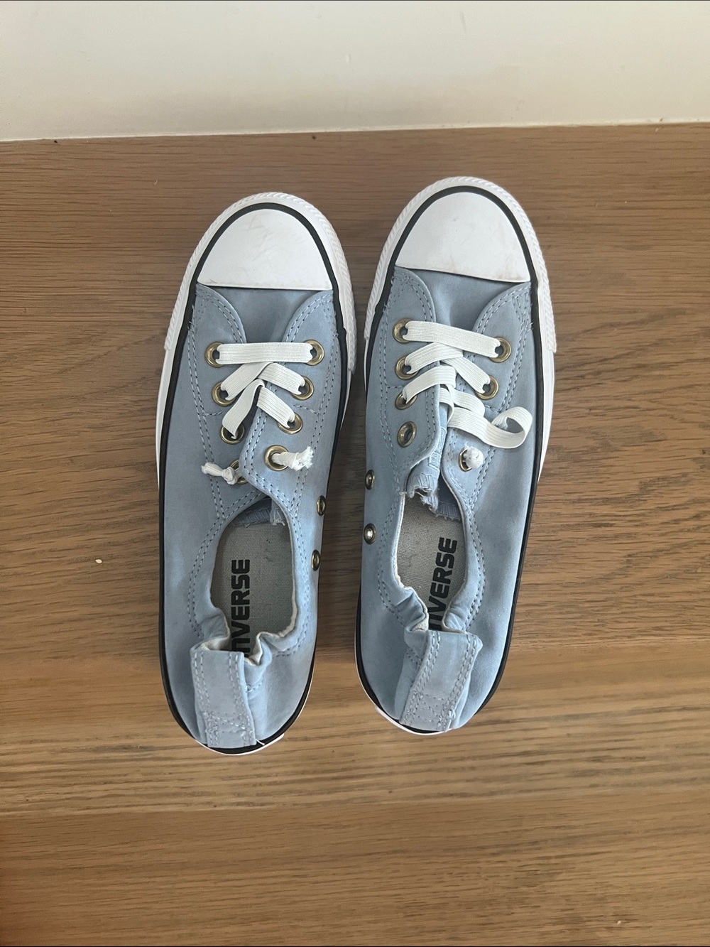 Converse Women’s Low Top Slip-On Sneakers in Light Blue